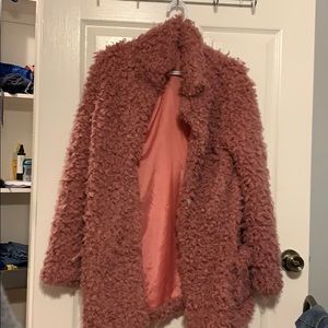 Super fashionable pink faux fur coat
